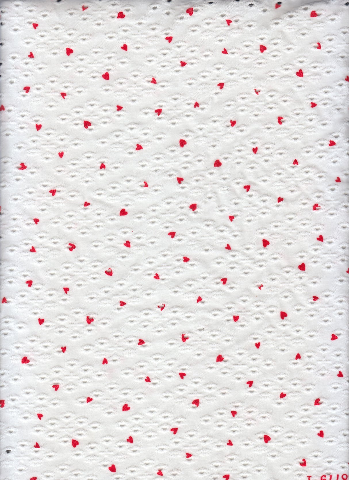 Heart Print Jacquard Eyelet Knit Fabric