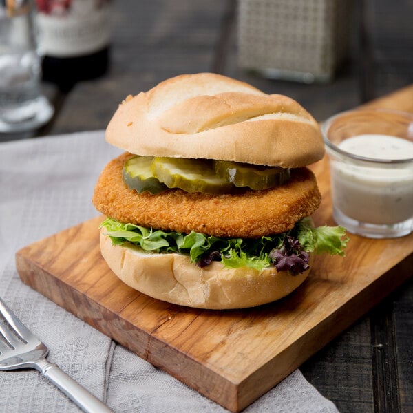 Brakebush 3.25 oz. Fully Cooked Breaded Chicken Breast Patties - 48/Case