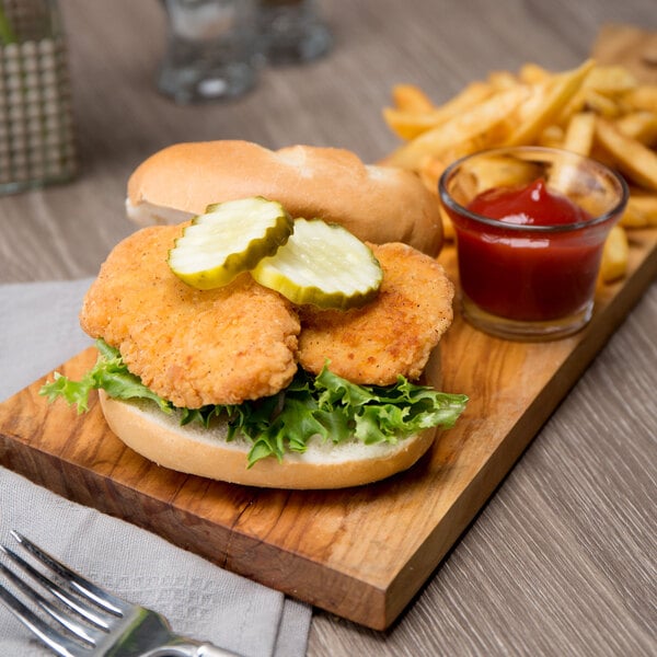 Brakebush Country Style 10 lb. Case 2 oz. Breaded Chicken Breast Sliders