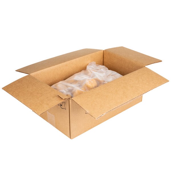 Tyson 5 lb. Bag of Frozen Uncooked Breaded Chicken Breast Nuggets - 2/Case