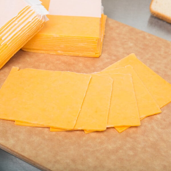 Great Lakes Cheese Yellow Mild Cheddar Cheese Slices - 192/Case