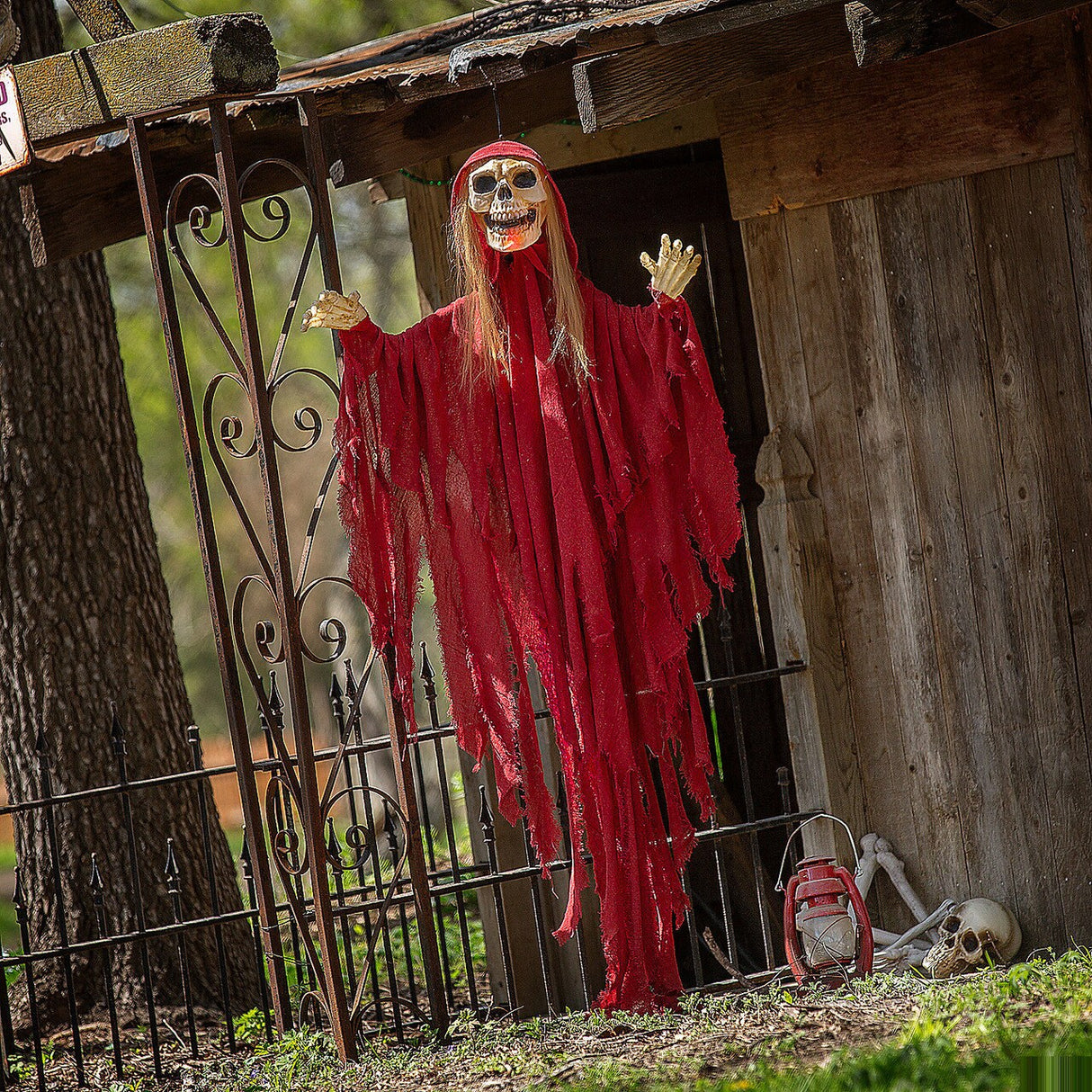 Light-Up Skeletal Reaper in Red Robes Halloween Hanging Decoration, 66 3/4"