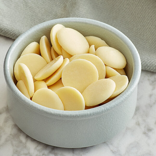 Guittard 25 lb. Creme Francaise 31% White Chocolate Wafers