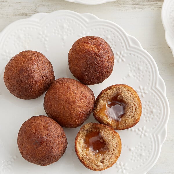 Rich's 1.31 oz. Ready-to-Finish Jumbo French Toast Filled Donut Bite - 220/Case