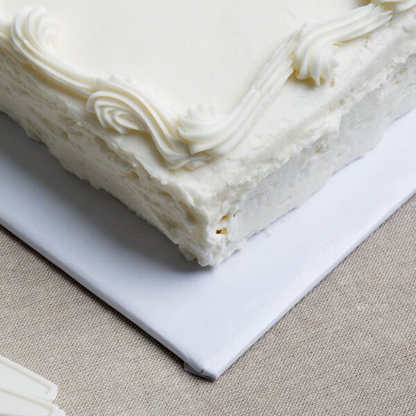 Quarter Sheet White Cake Board 13 3/4" x 9 3/4" Fold-Under 1/4" Thick