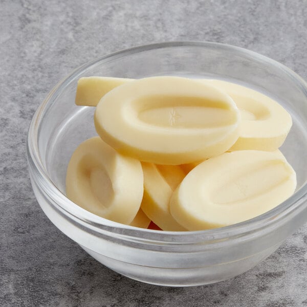 Valrhona Ivoire 35% White Chocolate Feve 6.6 lb. - 3/Case