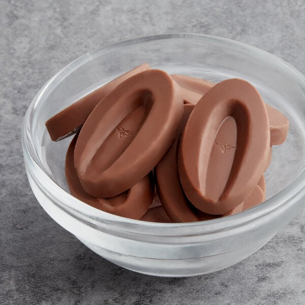 Valrhona Caramelia 36% Milk Chocolate Feve 6.6 lb. - 3/Case
