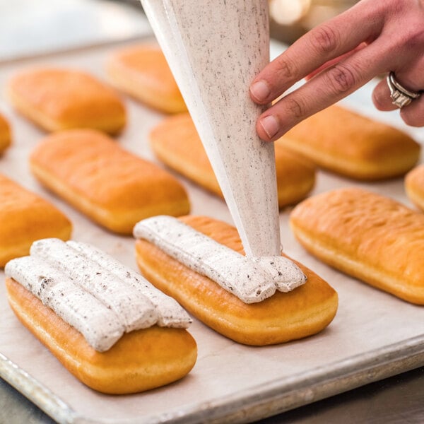 Rich's 2.25 oz. Ready-to-Finish Unfilled Long John Yeast Donut - 60/Case
