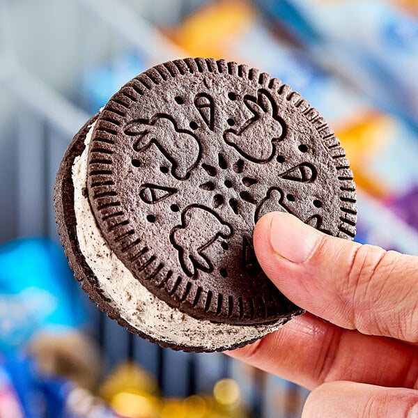 Blue Bunny Cookies 'n Cream Round Frozen Dessert Sandwich 4.5 oz. - 24/Case