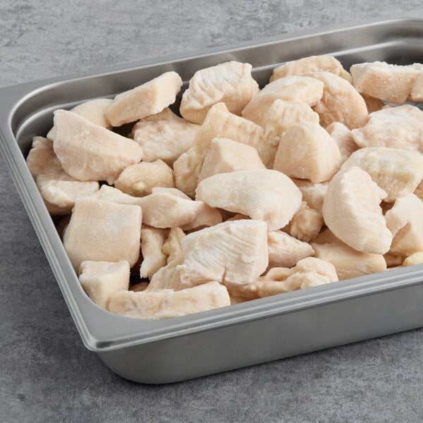 Brakebush Farm Pantry 1 oz. Boneless Skinless Halal Chicken Breast Chunks - 160/Case