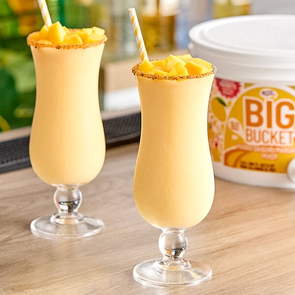 Master of Mixes Big Bucket Mango Daiquiri / Margarita Mix 96 fl. oz. - 4/Case