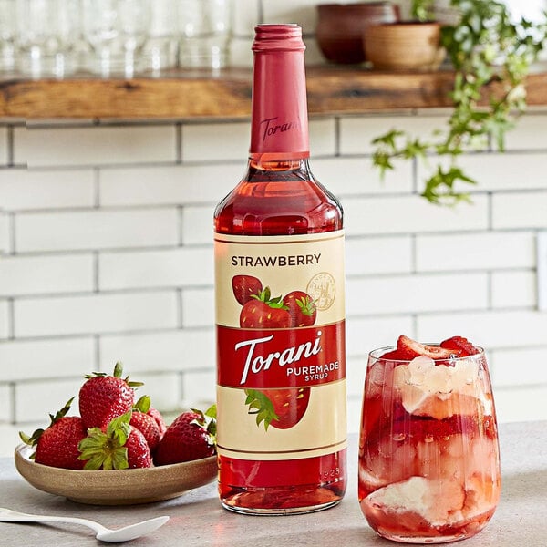 Torani Puremade Strawberry Flavoring Syrup 750 mL Glass Bottle - 4/Case