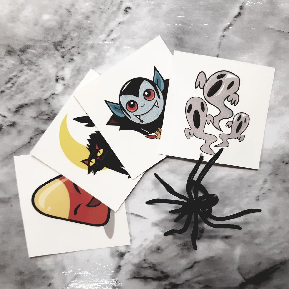 24 Piece Black Spider Ring Topper plus 24 Halloween Tattoos