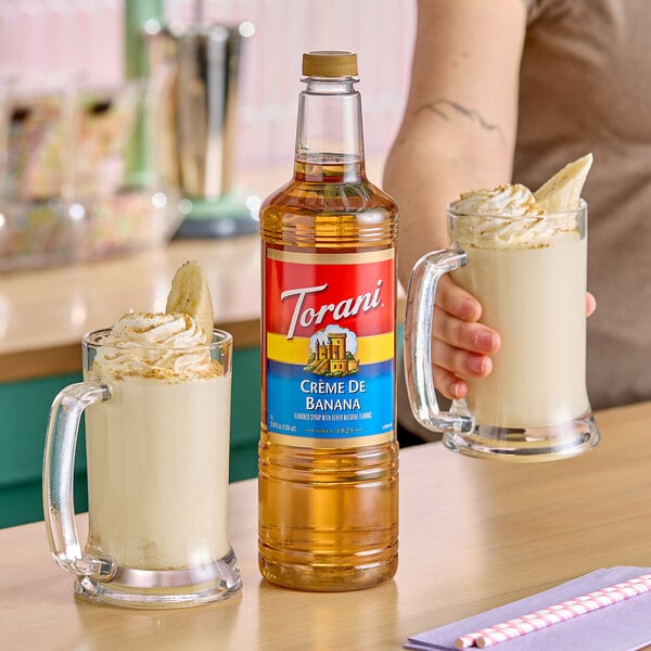 Torani Creme de Banana Flavoring / Fruit Syrup Plastic Bottle 1 Liter - 6/Case