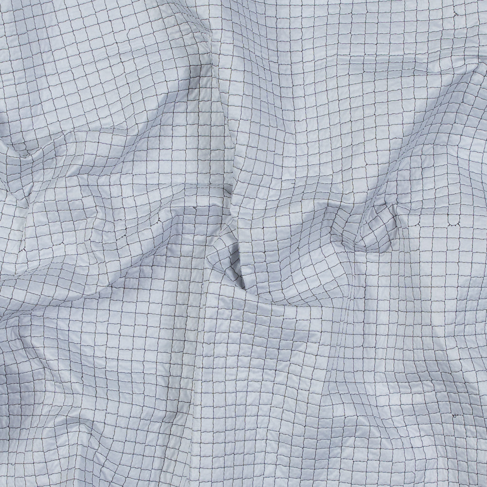 Black and White Reversible Quilted Coating with Filler