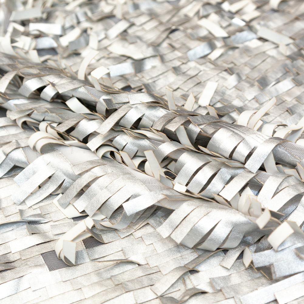Faux Leather Fringe Fabric on a Mesh Backing - Metallic Silver on White