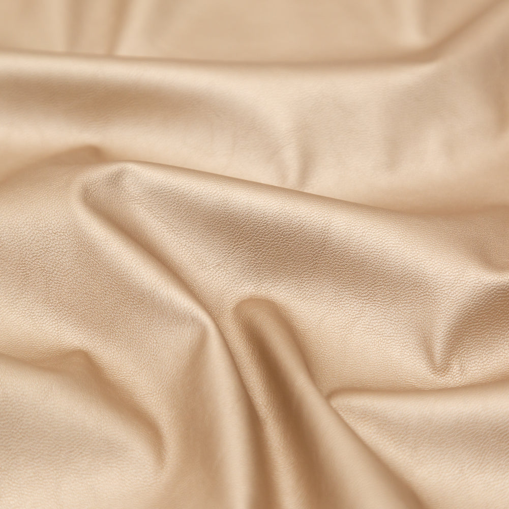 Italian Metallic Champagne Faux Leather Laminate over a Latte Stretch Faux Suede