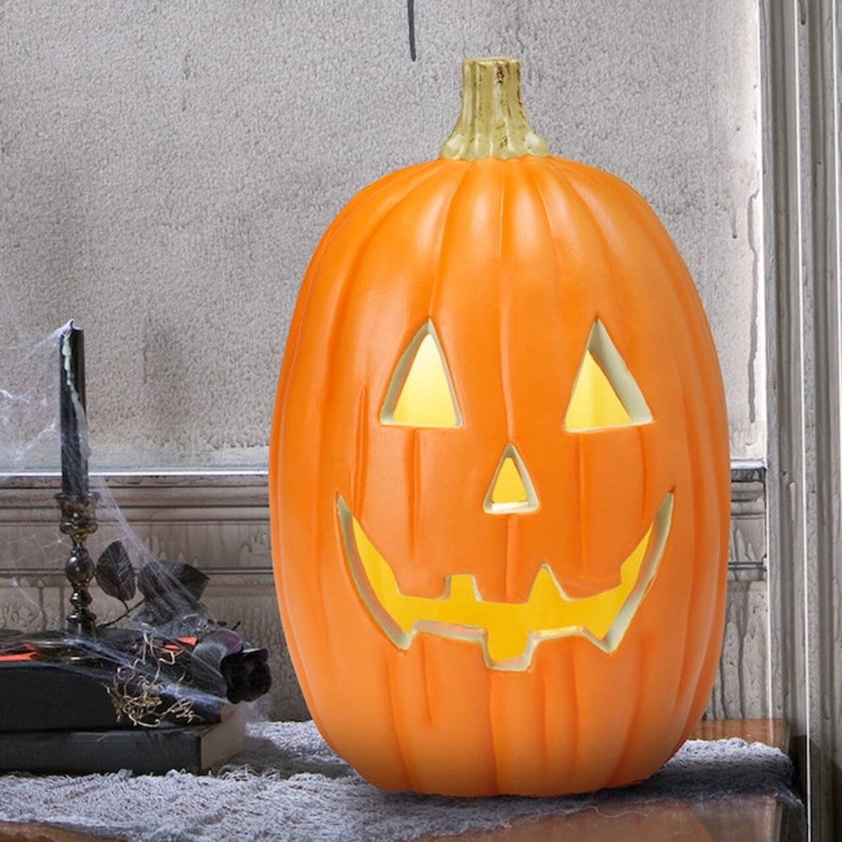 Haunted Living 1.5-ft Lighted Jack-O-Lantern Decoration – Indoor Halloween Pumpkin
