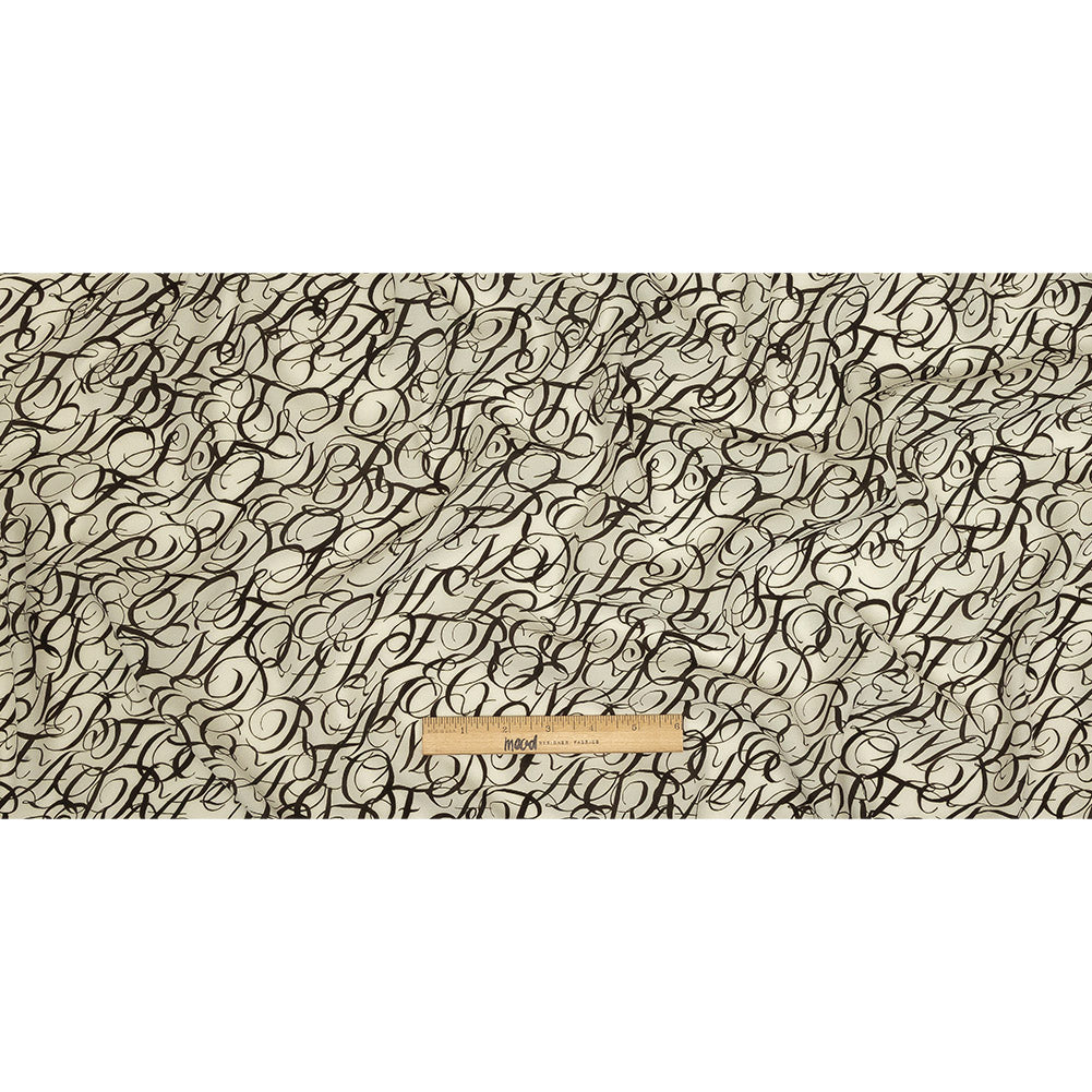 Sustainable Viscose Woven Print - White Calligraphic Letters - Mood Exclusive Dear Ms. Austen