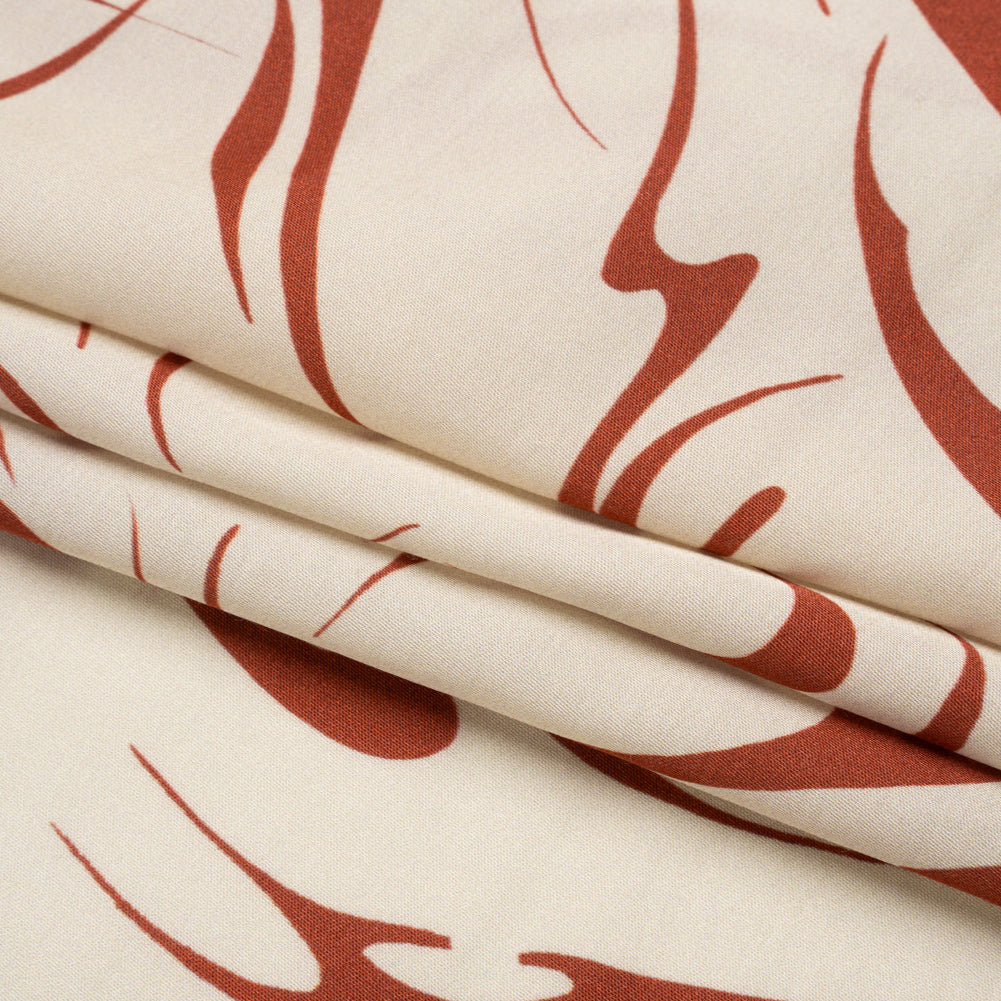 Sustainable and Recycled Viscose Satin Print - Red and Cream Swirls and Stars - Mood Exclusive Vincent's Hope