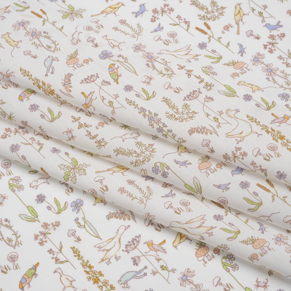 Liberty Fabrics Tana Lawn® - Theo Yellow - Pale Yellow, Spring Green and Blue Cartoon Creatures and Flowers