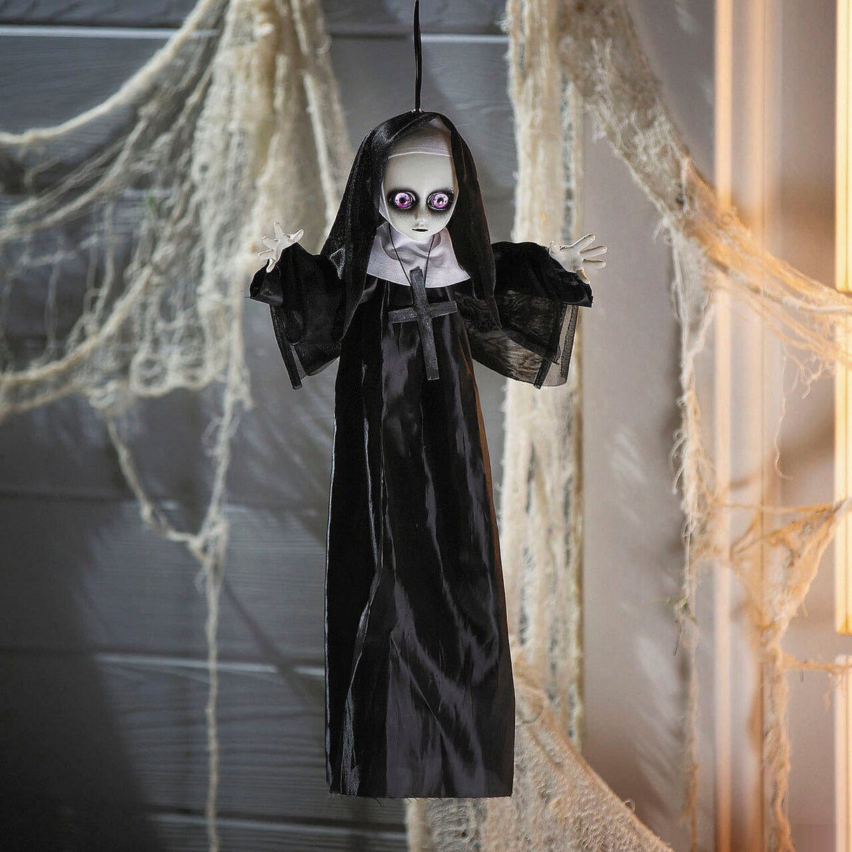19 3/4" Hanging Black and White Nun with Cross Halloween Decoration