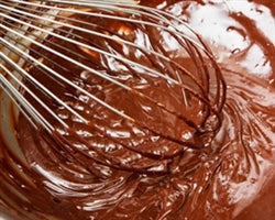 Guittard Milk Chocolate Flavored A'Peels Melting Wafers - 25 Pound Box