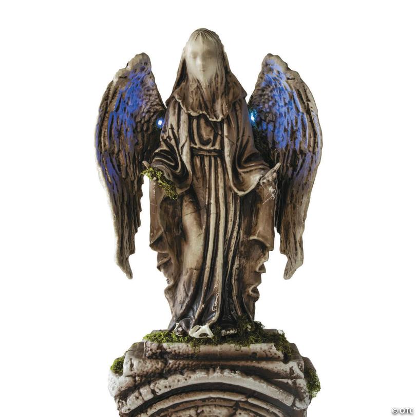 5 Ft. 7" Tombstone with Light-Up Angel & Skulls Halloween Decoration