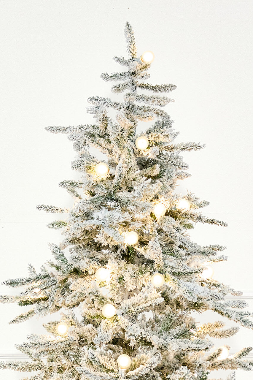 7' Flocked Christmas Tree with 63 G40 LED Lights