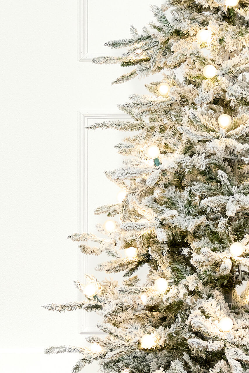 7' Flocked Christmas Tree with 63 G40 LED Lights