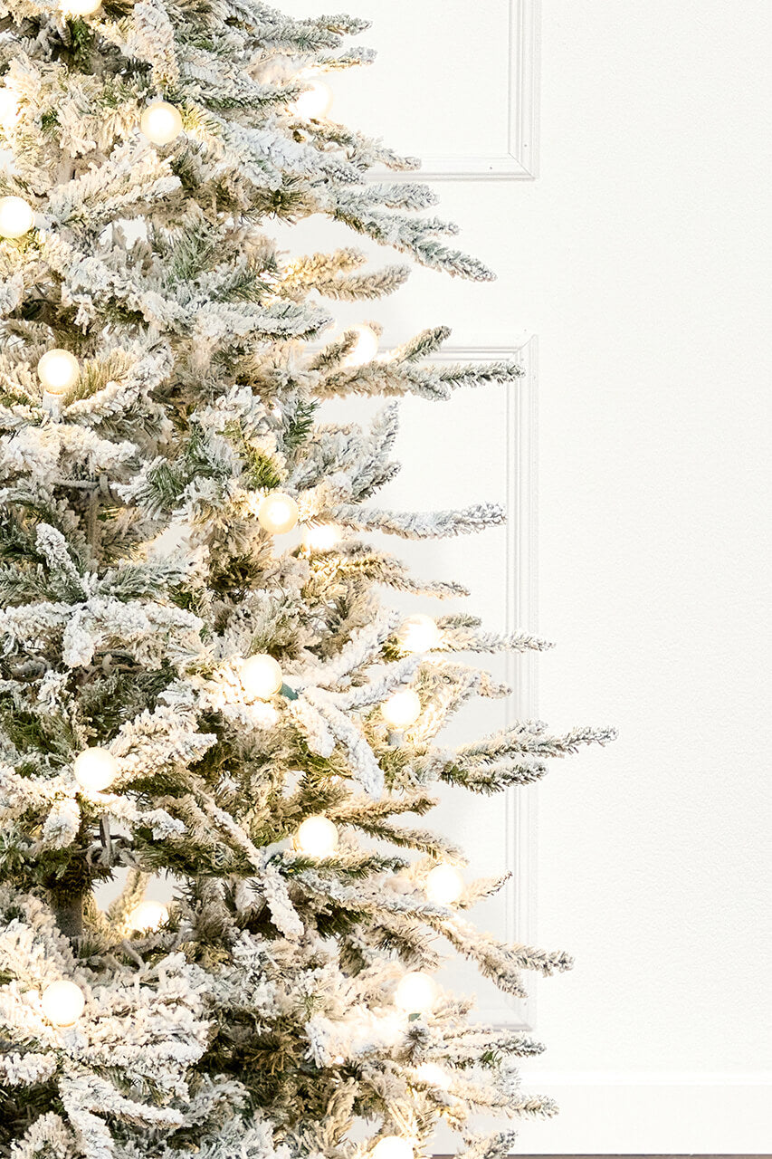 7' Flocked Christmas Tree with 63 G40 LED Lights