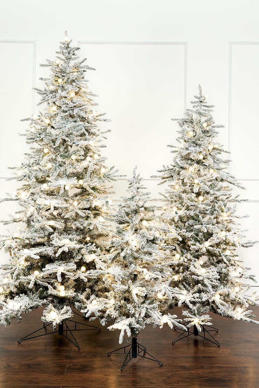 7' Flocked Christmas Tree with 63 G40 LED Lights