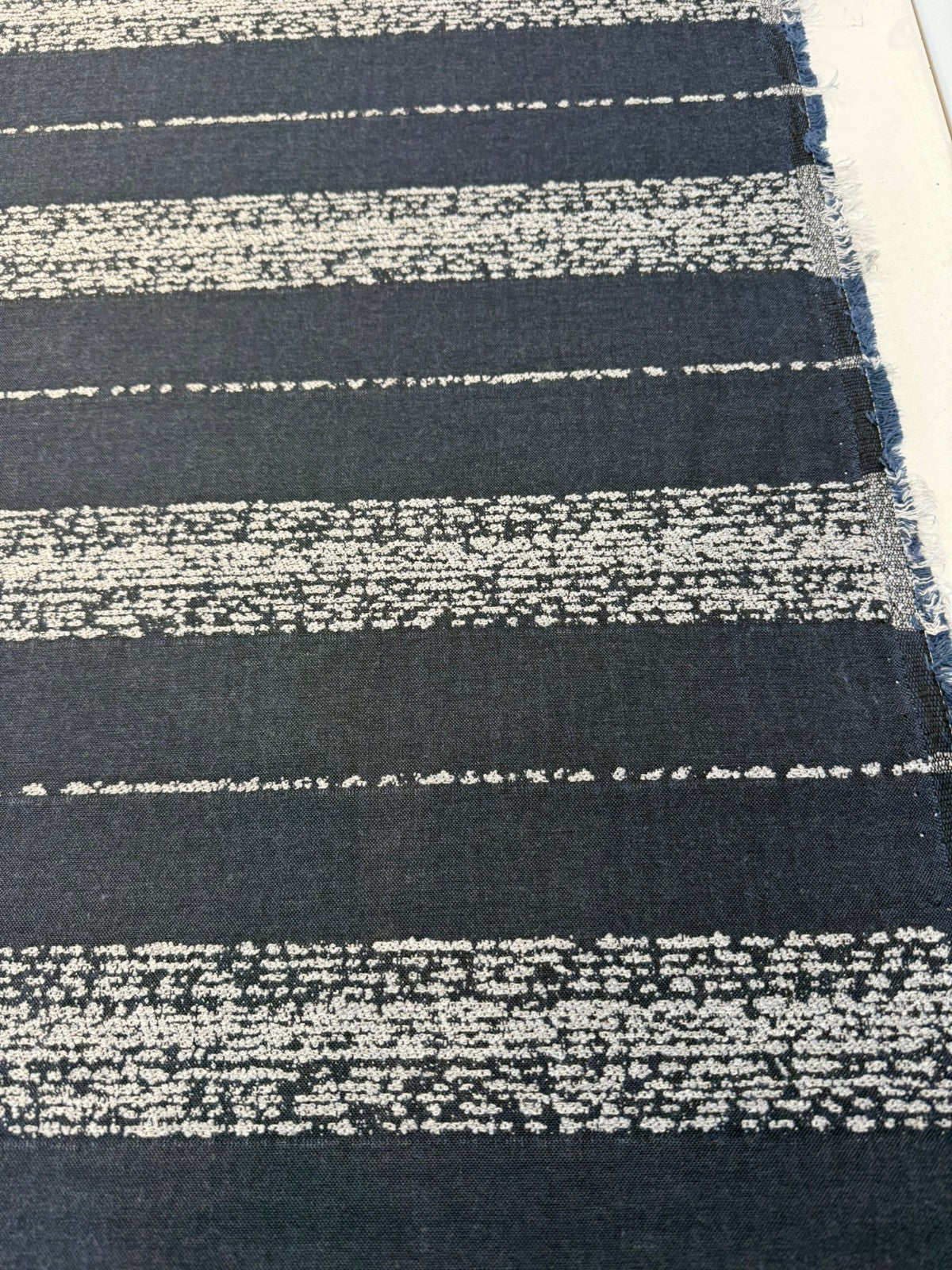 Sunbrella Alaxi Bel Air Nightfall Sunbrella Acrylic Fabric - Navy Blue, Textured White Horizontal Stripes, 54" Width (By The Yard)