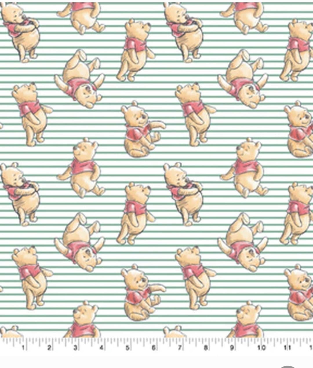 Quilting Cotton Disney Winnie the Pooh on Blue Stripes