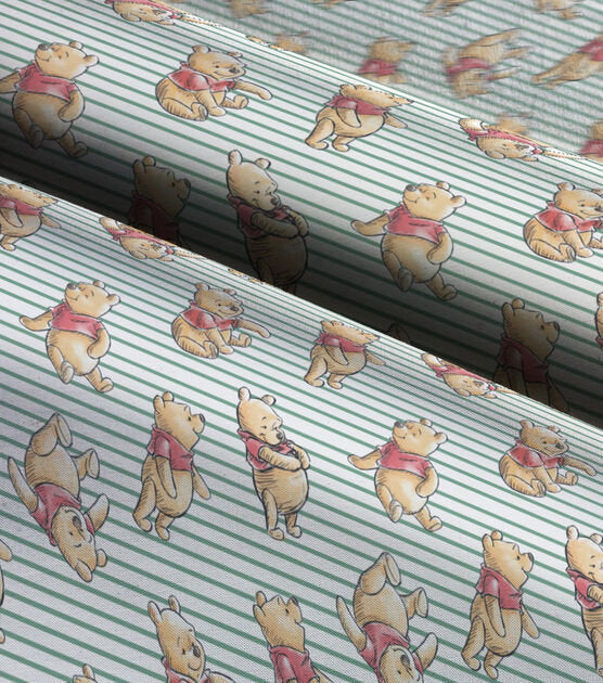 Quilting Cotton Disney Winnie the Pooh on Blue Stripes