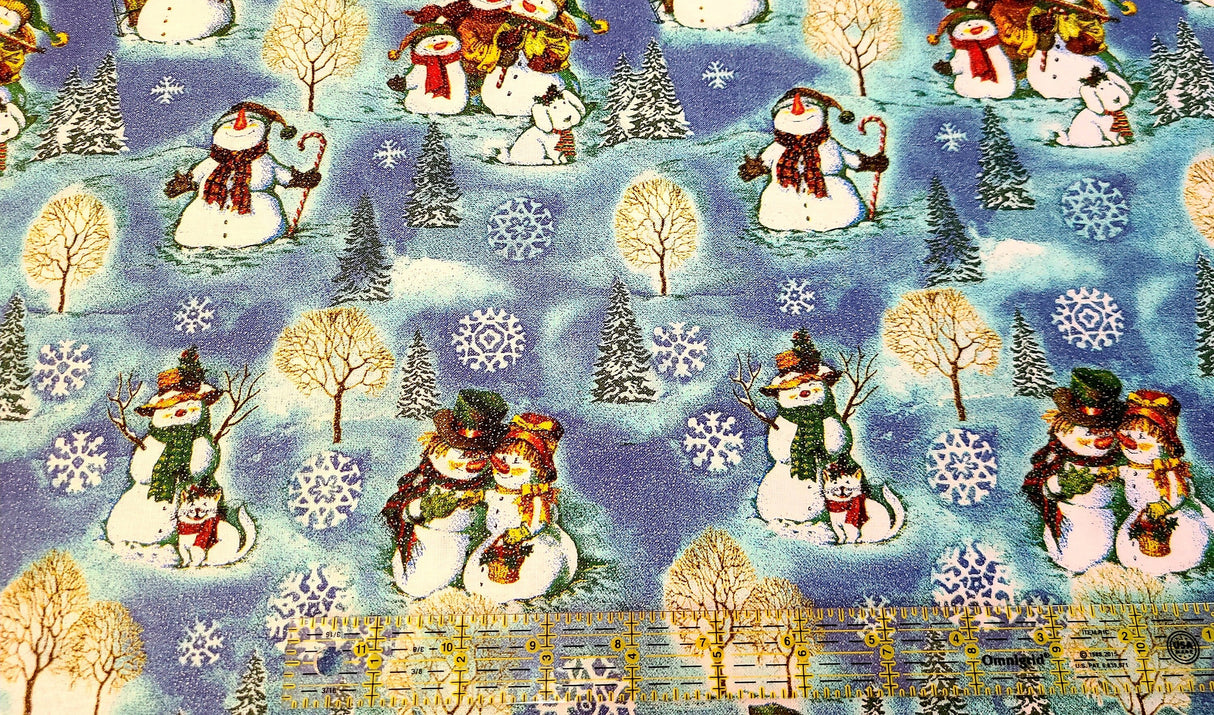 Quilting Cotton Happy Snowman Family on Blue Timeless Treasures