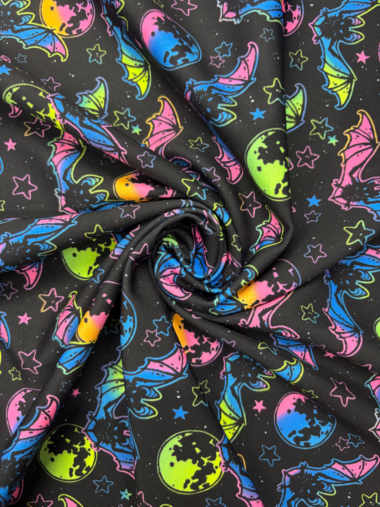 Rainbow Bats Blacklight Reactive Spandex Fabric - Blacklight Reactive Bats Print, 58"/60" Width (1 Yard)