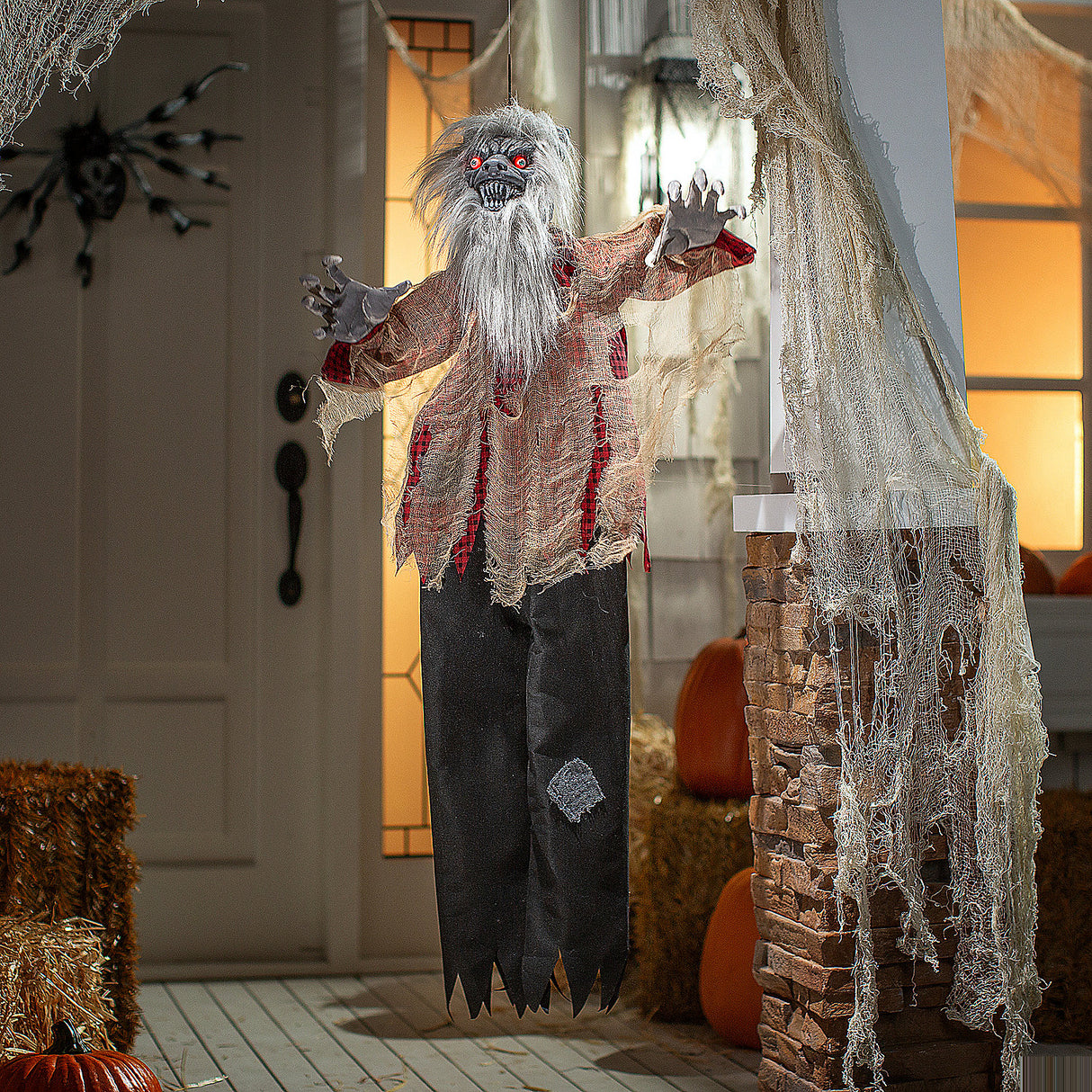 Terrifying Hanging Animated Tattered Werewolf Halloween Decoration for Spooky Home Decor and Yard Display