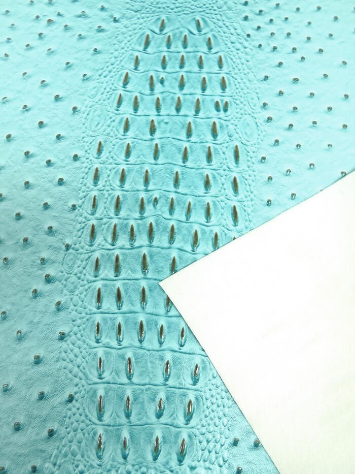 Glacier Blue Mutant Ostrich Gator Embossed Vinyl Fabric