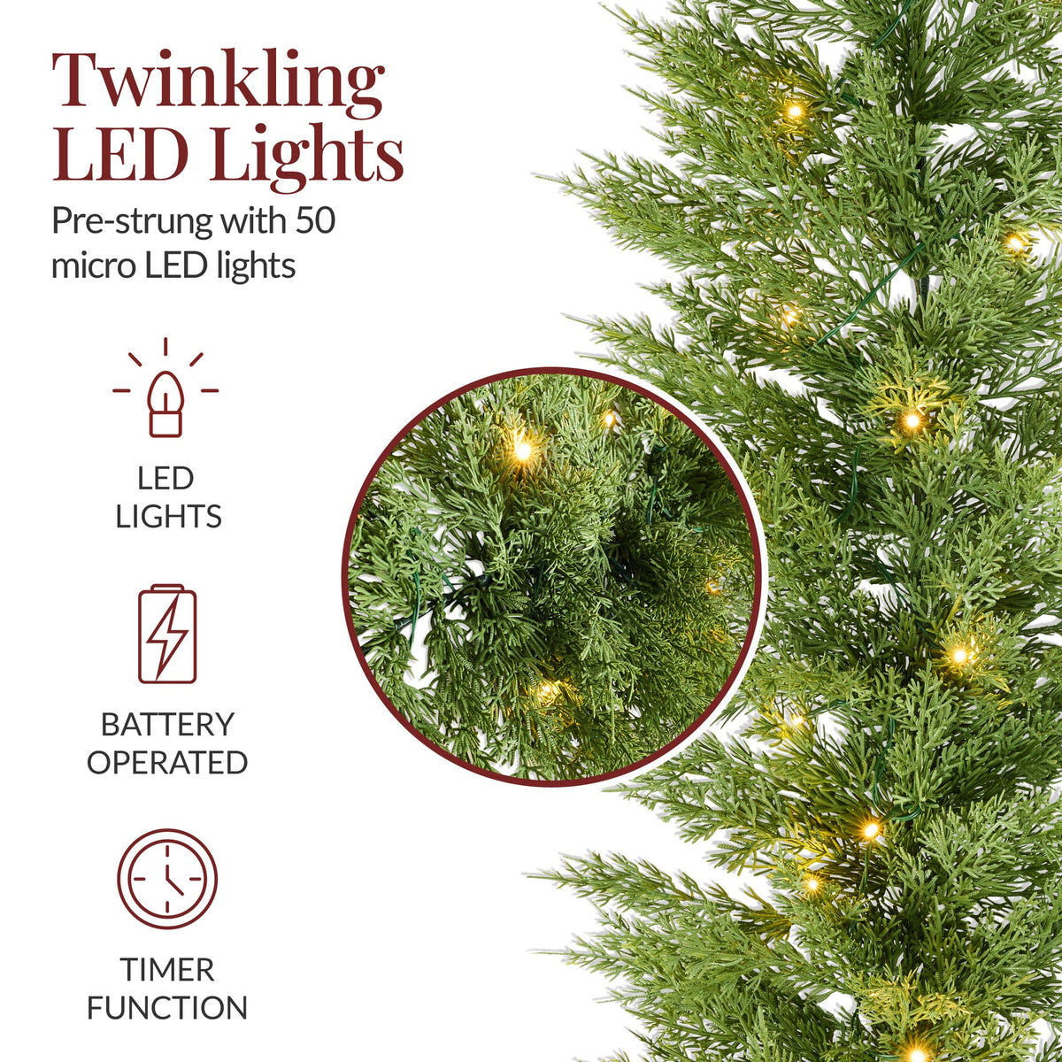 Pre-lit cedar cypress Christmas garland with twinkling LED lights draped over a mantel