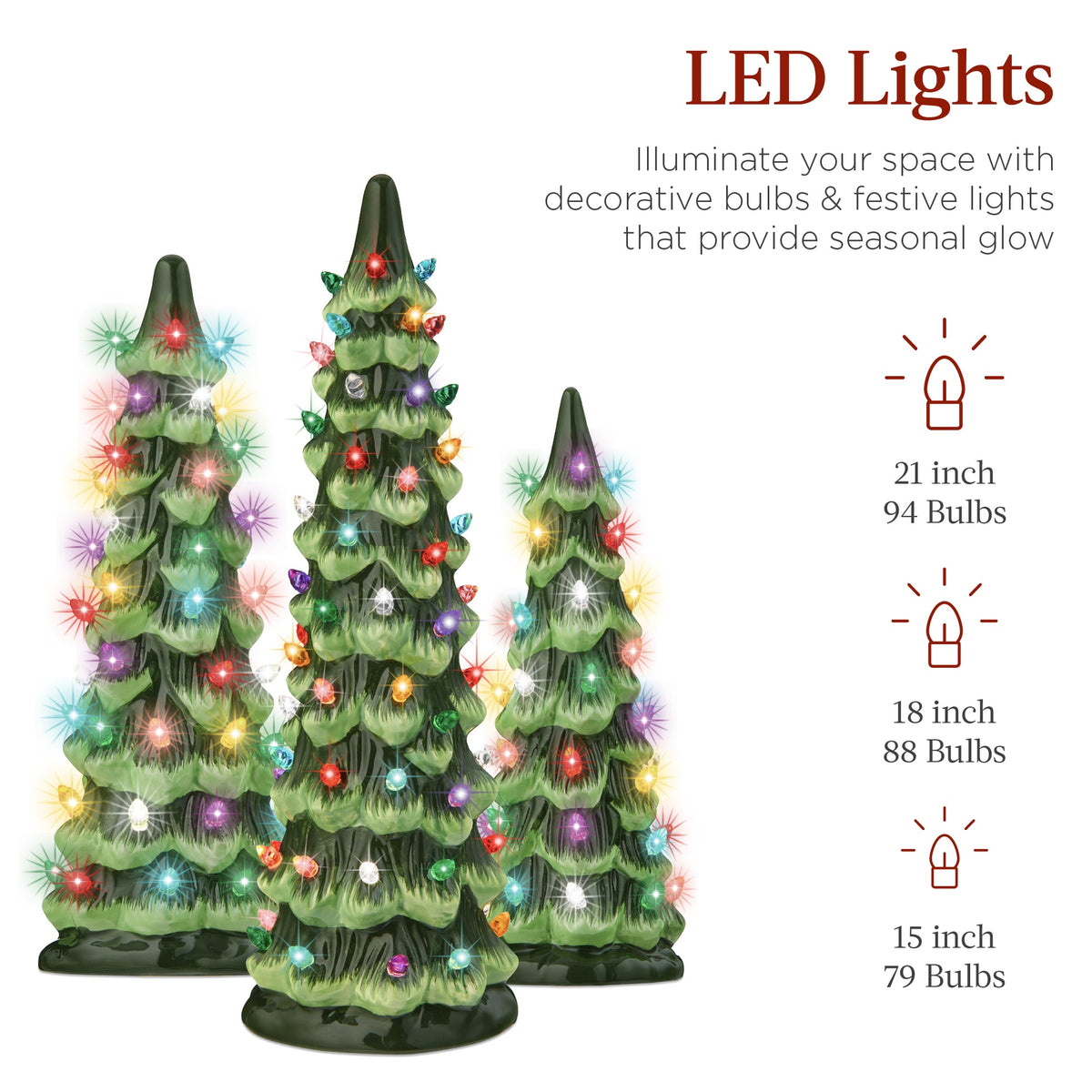 Set of XL hand-painted ceramic Christmas trees with glowing LED lights displayed together