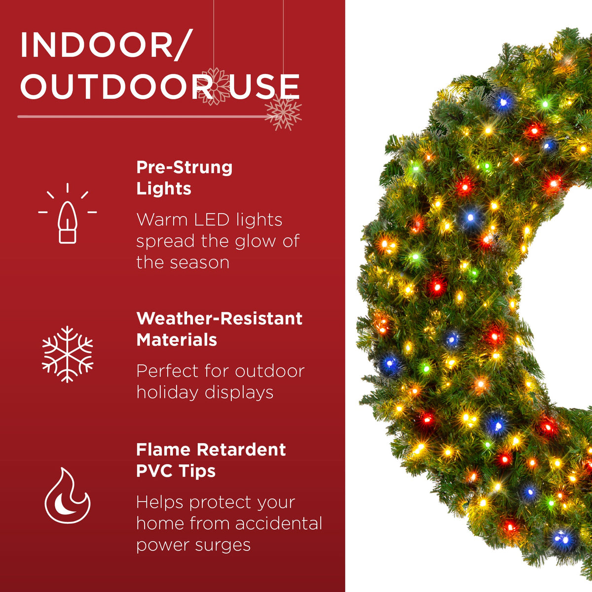 Pre-lit artificial fir Christmas wreath glowing with multicolor LED lights on a wooden door