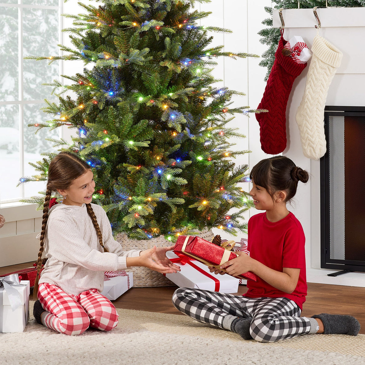 Pre-Lit Artificial Aspen Slim Noble Fir Christmas Tree with Stand product image showing its overall design and key.