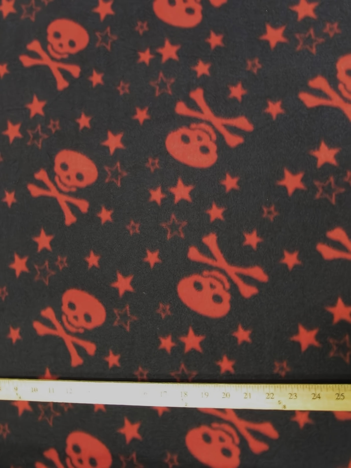 Skull Bones Black and Red Stars Fleece Fabric