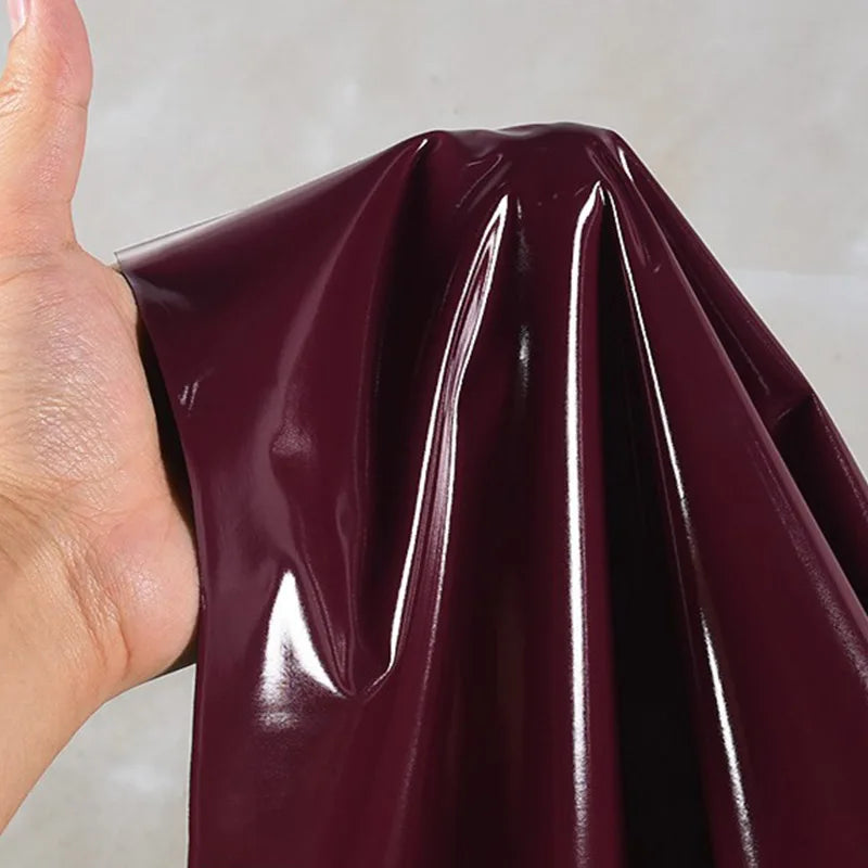 New Wine Red Elastic Shiny Mirror PU Leather Fabric Waterproof Clothing Designer Fabric Sewing Material DIY Tights Pants Clothes