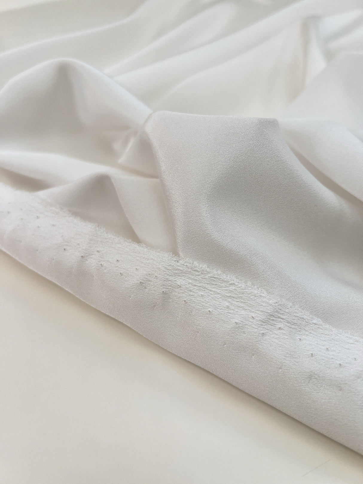 White Shade Crepe Polyester Fabric