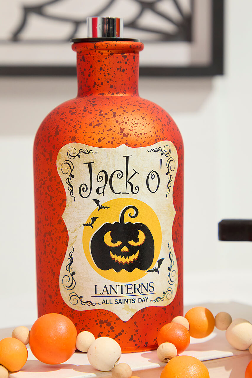 7"H B/O Lighted Glass Halloween Bottle Luminary