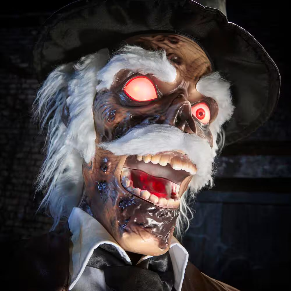 7-ft Grave and Bones Animated LED Zombie Barber Halloween Decoration