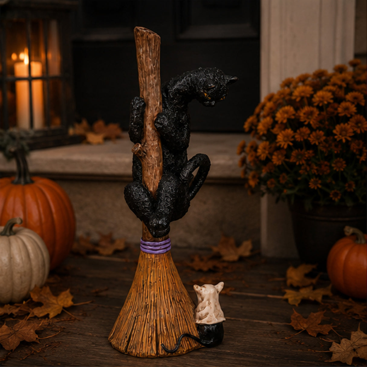 13 in. Halloween Black Cat with a Broom Tabletop Decoration