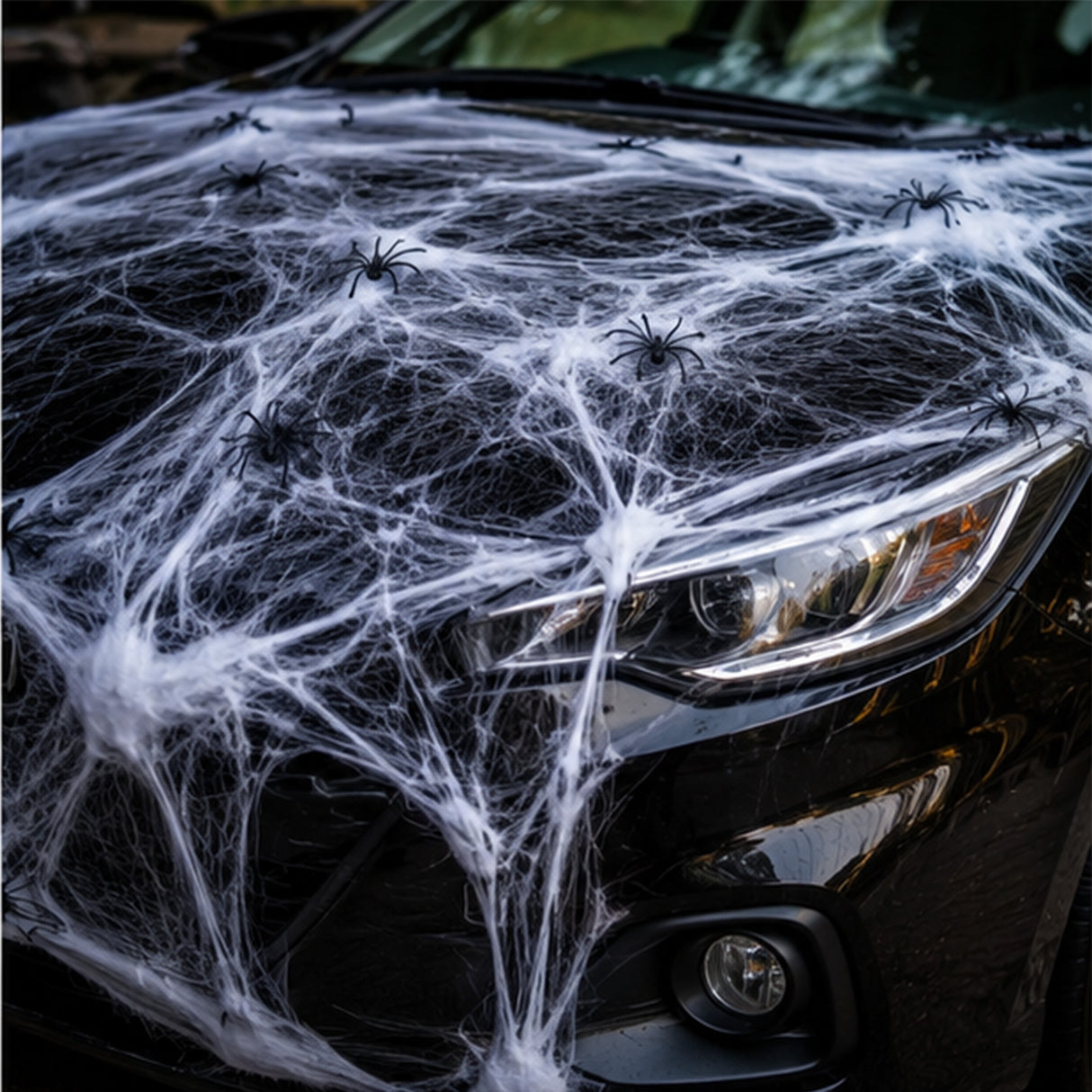 Stretchable Spider Web Halloween Decorations with Spiders – 12 Pc.